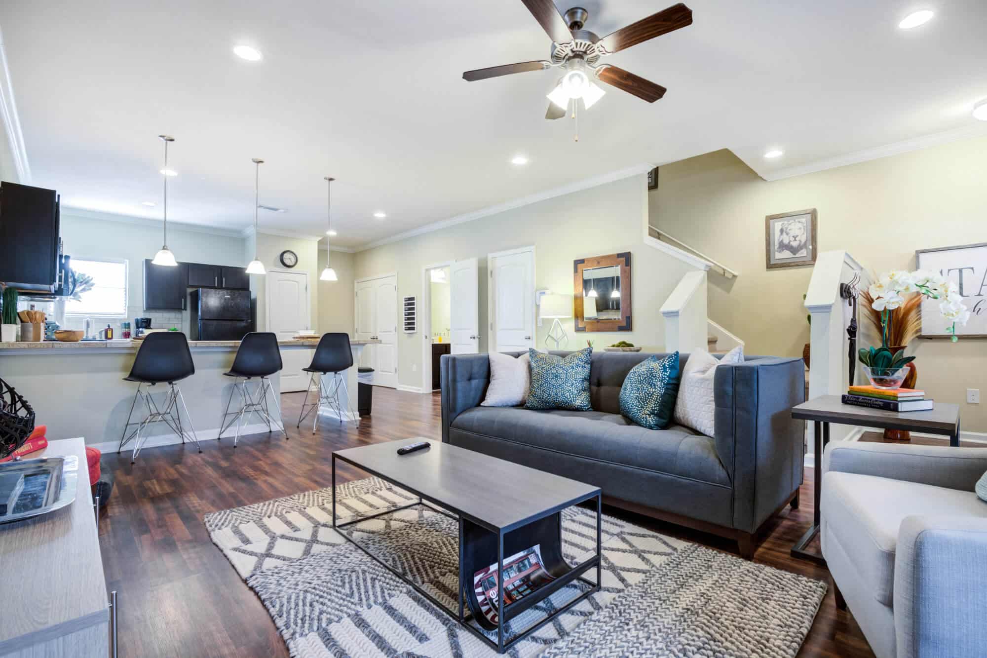 the collective at clemson off campus apartments near clemson university fully furnished 2 story floor plans living room and kitchen guest half bath